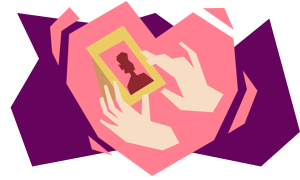 a heart shape with hands holding a picture frame inside