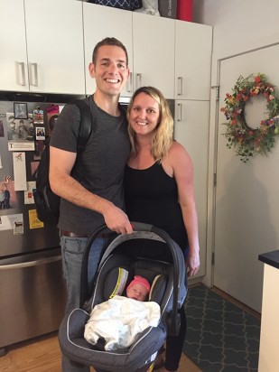 Meagan and her husband with Margo and all their packed up CF supplies