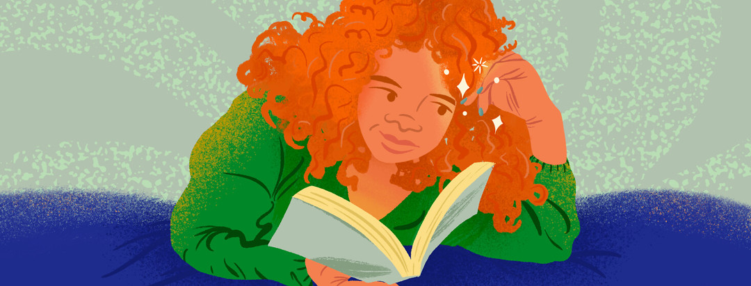 Woman with curly red hair reads book laying down, looking at her sparkling nails