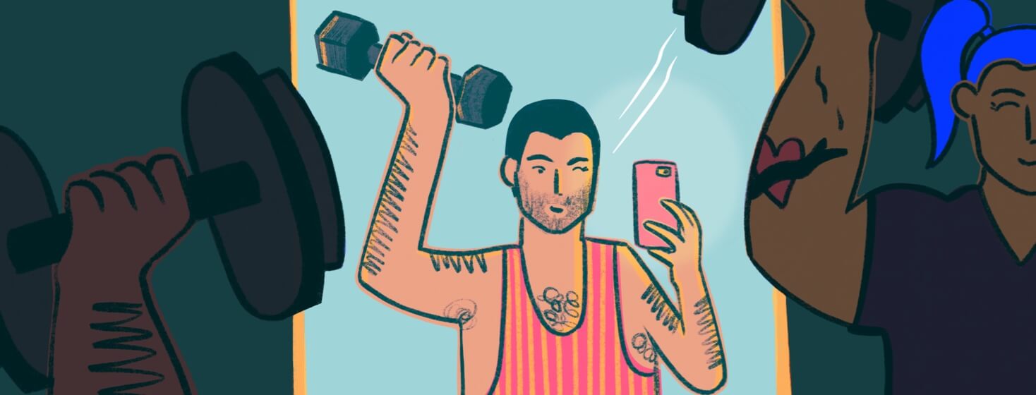 Young adult takes a mirror selfie at the gym